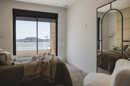 Modern Bedroom with a Scenic View
