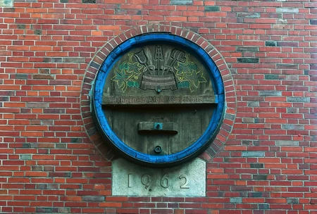 Rustic Barrel Decoration on Brick Wall