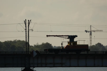 Industrial Silhouette on a Bridge