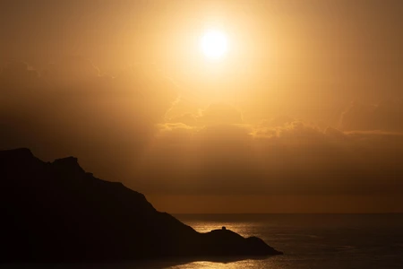 Sunset Over Cliff