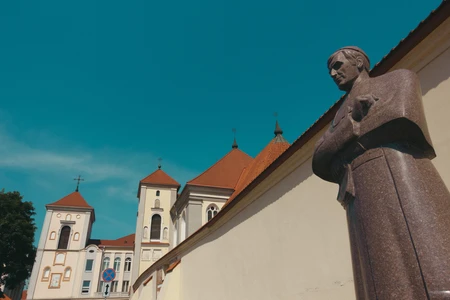 Historic Statue with Architectural Backdrop