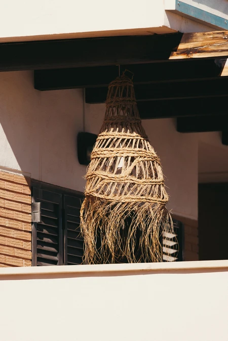 Rustic Woven Lamp in Courtyard
