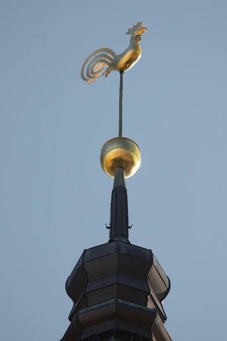Golden Weather Vane on a Steeple