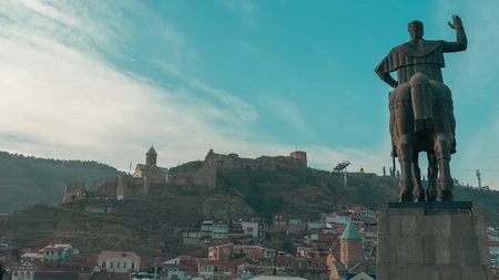 Historic City Skyline with Statue