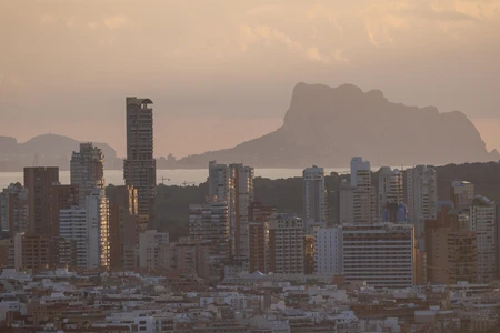 Cityscape with Mountain Backdrop