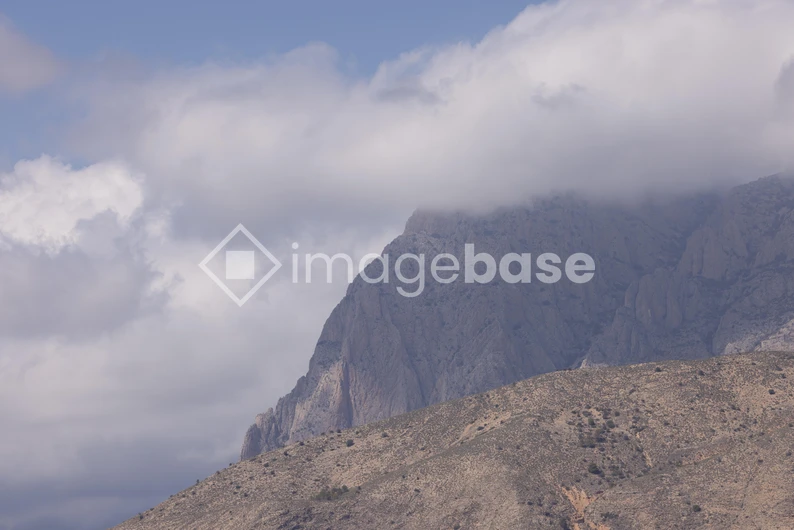 Mountain Peak in Clouds