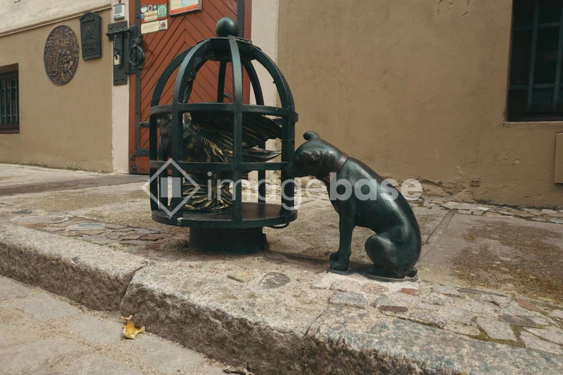 Street Sculpture of Dog and Cage