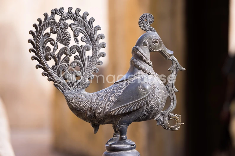 Intricate Metal Bird Sculpture
