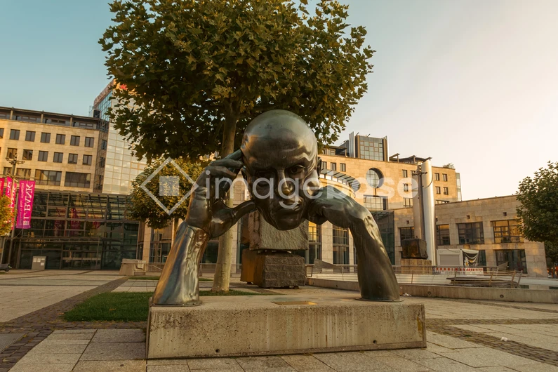 Bronze Sculpture in Urban Plaza