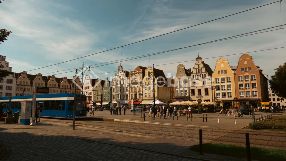 Colorful City Street with Tram