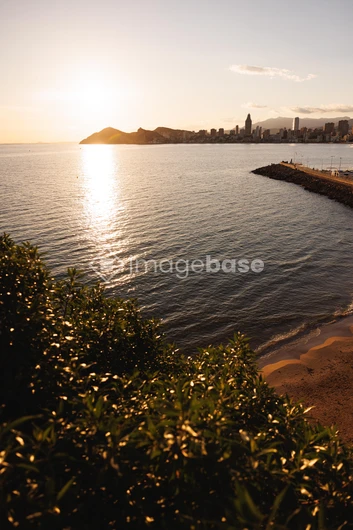 Sunset Over Coastal City