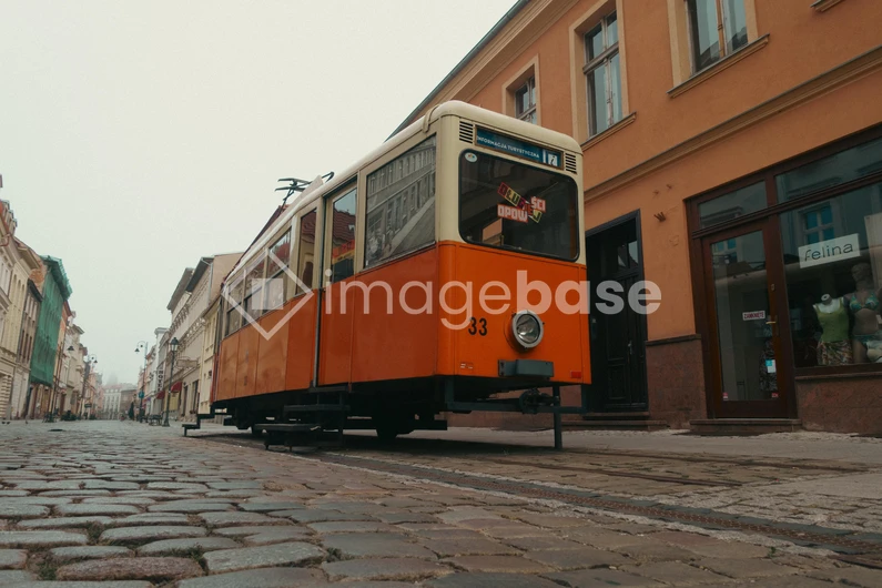 Vintage Streetcar on Cobblestone Street