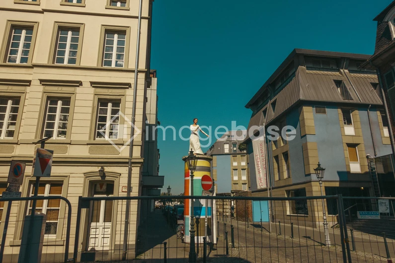 Urban Street Scene with Sculpture
