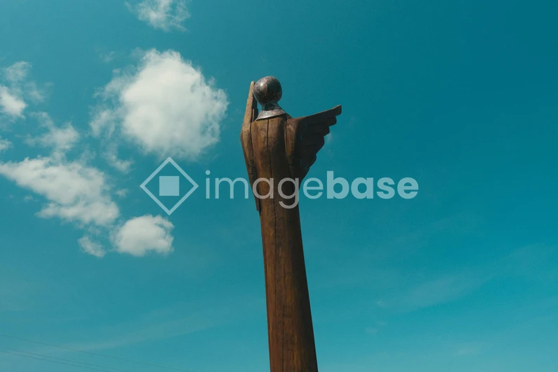 Sculpture Under Blue Sky