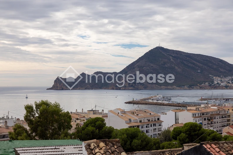 Coastal Town with Mountain View