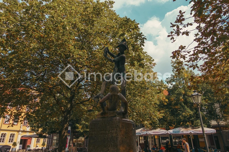 Statue in a Lush Park