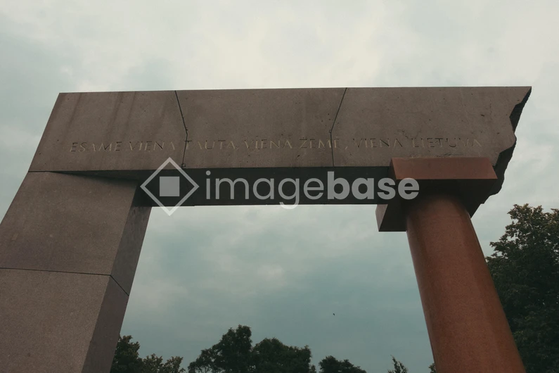 Modern Monument Under Cloudy Sky