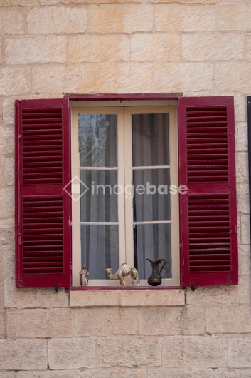 Vintage Window with Red Shutters