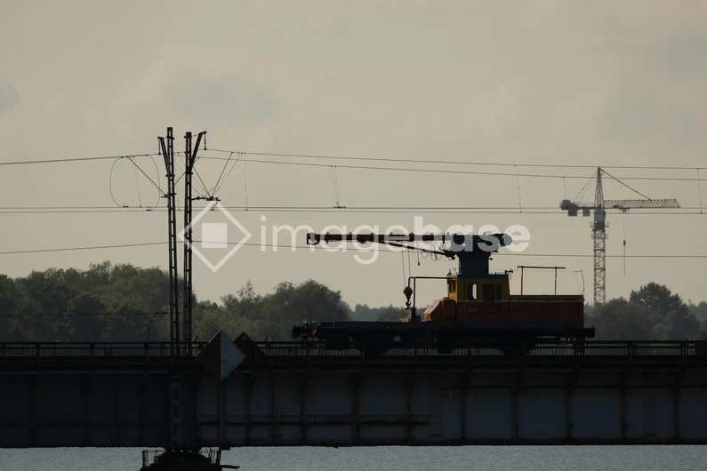 Industrial Silhouette on a Bridge