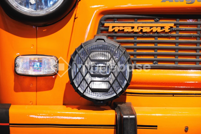 Orange Vehicle Headlight Close-up