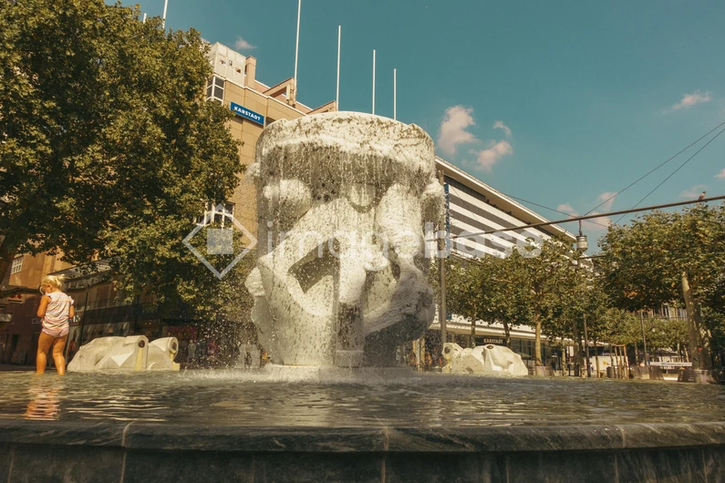 Urban Fountain in Sunlight