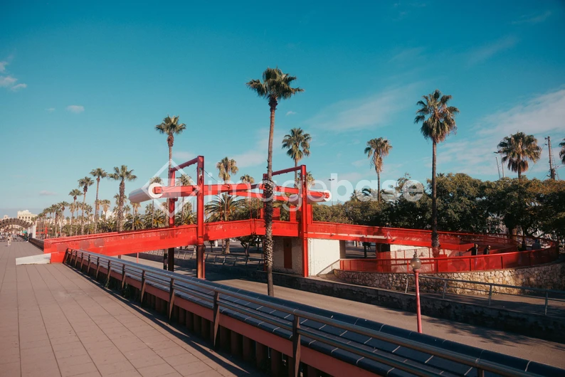 Red Bridge with Palm Trees