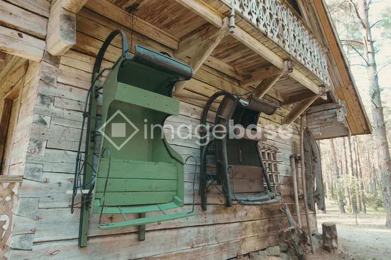 Historic Sleds on Rustic Cabin