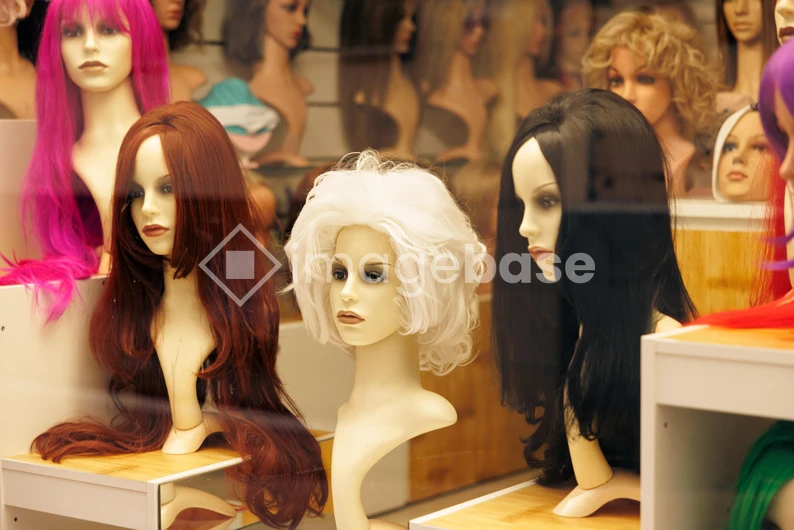 Wig Display in Shop Window