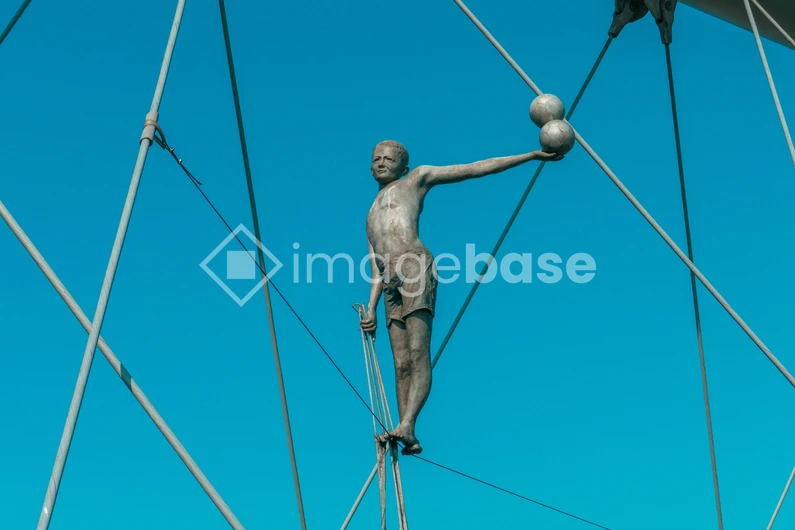 Statue Against Blue Sky