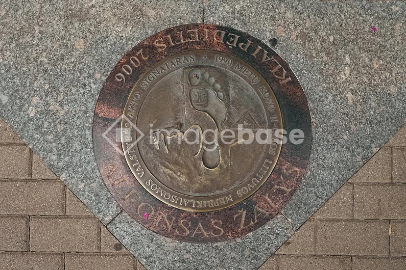 Commemorative Coin Embedded in Pavement