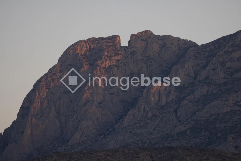Sunlit Mountain Peak