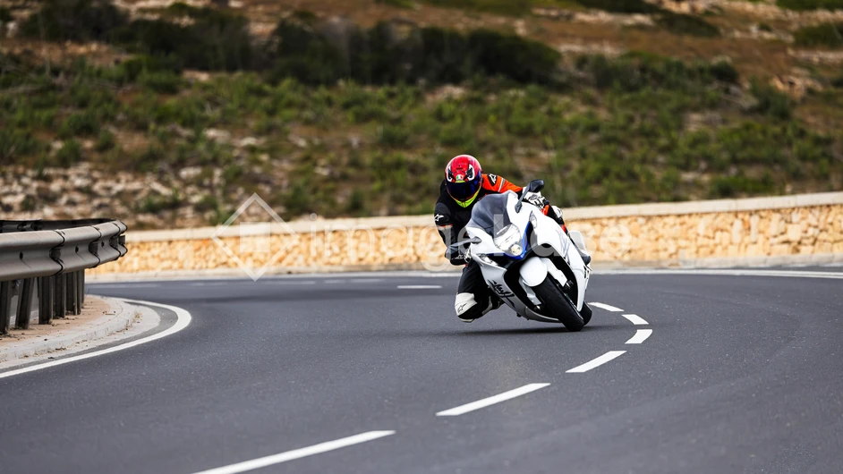 Motorcyclist on a Scenic Road
