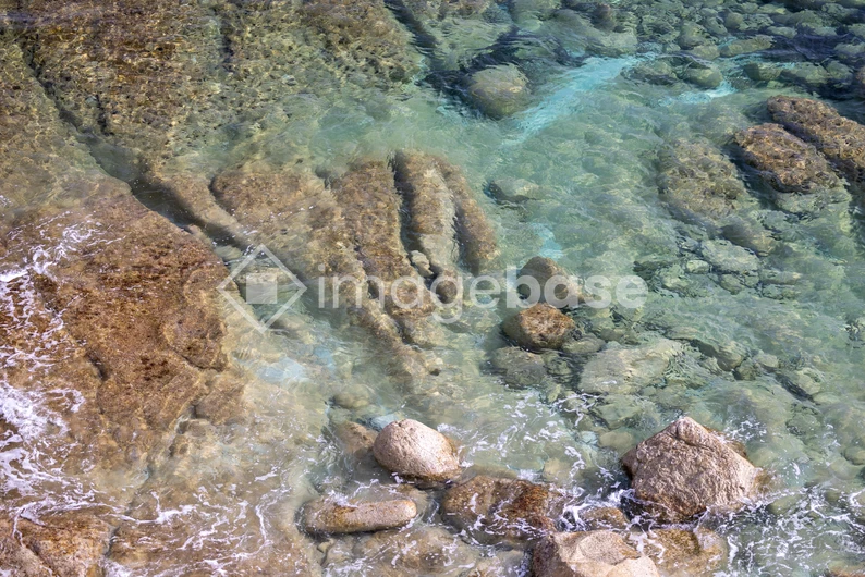 Rocky Shoreline Under Clear Water
