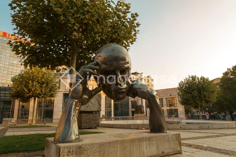 Bronze Sculpture in Urban Setting