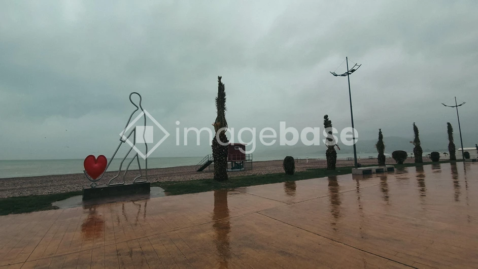 Rainy Coastal Promenade