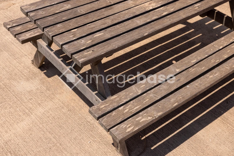 Wooden Picnic Table in Sunlight