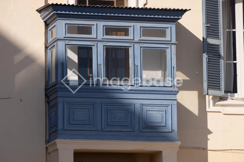 Blue Shuttered Balcony