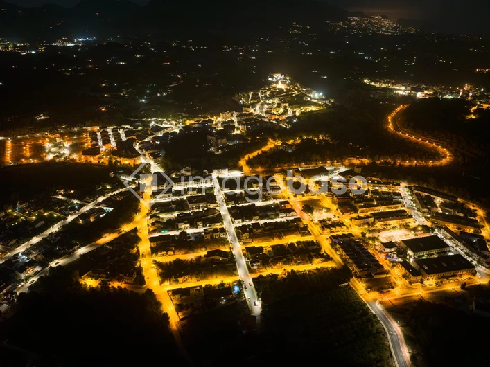 Nighttime Aerial View of a Town