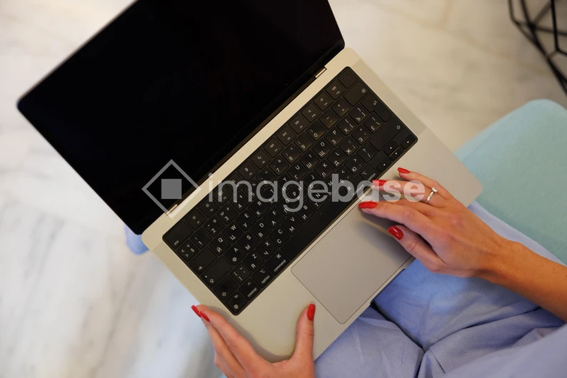 Woman Working on Laptop
