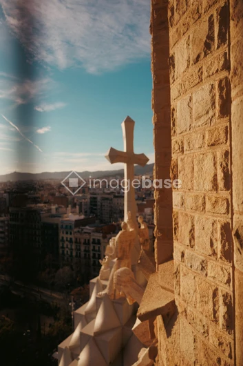 Rooftop Cross Overlooking Cityscape
