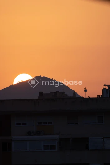 Sunset over City Silhouette