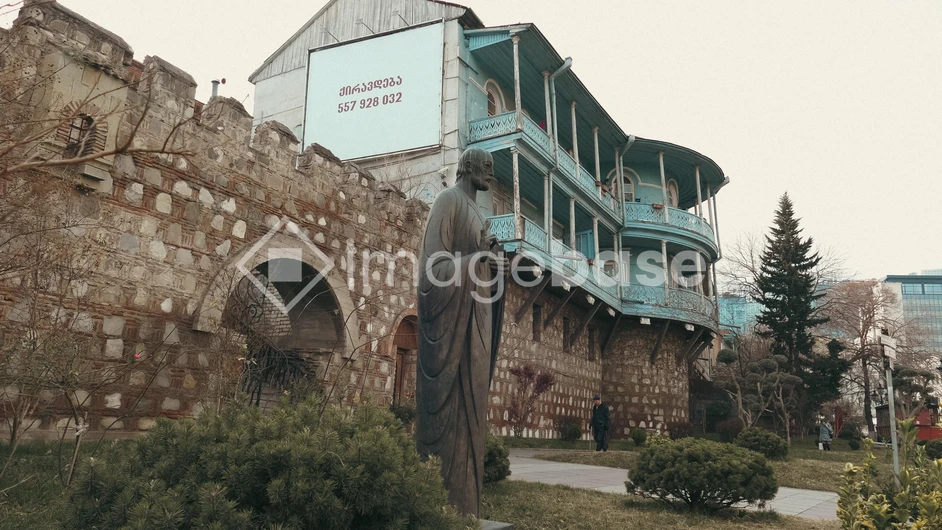 Historic Stone Building with Statue