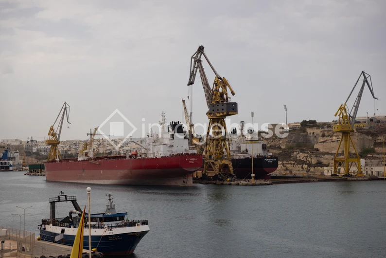 Harbor with Ships and Cranes