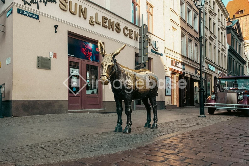 Bronze Donkey on Cobblestone Street