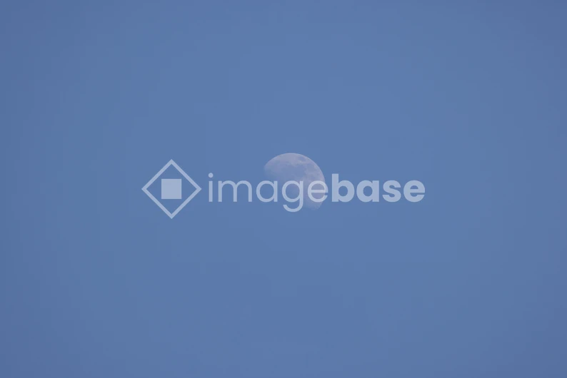 Moon in Daylight Sky