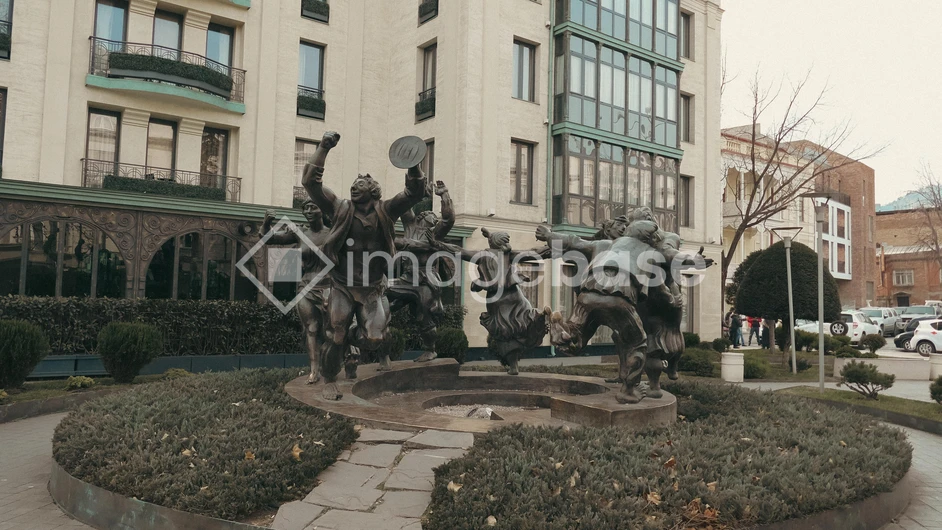 Statue with Building Backdrop