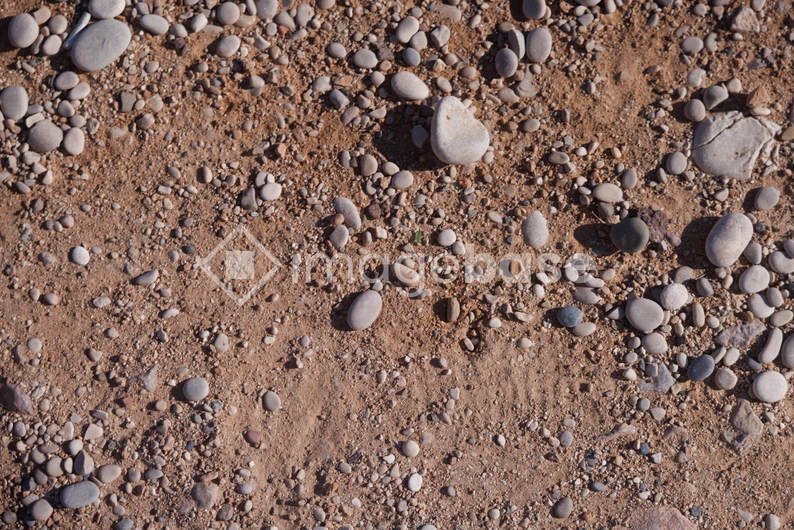 Pebble Texture on Sandy Beach