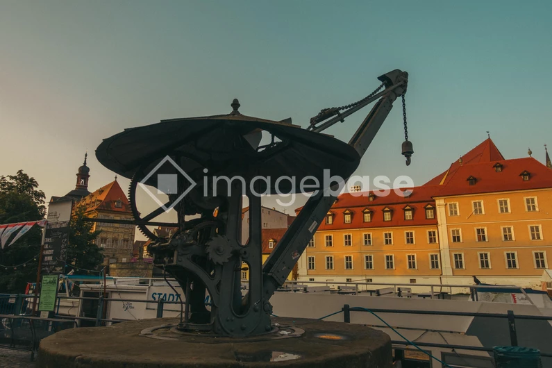 Historic Waterfront Crane at Sunset