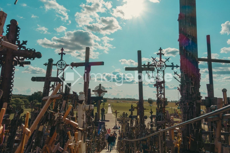 Hill of Crosses Under a Bright Sky