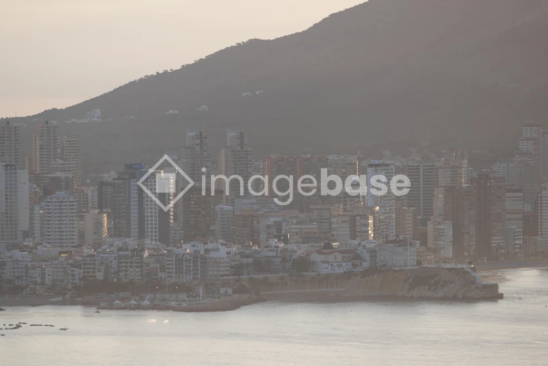 Sunset Cityscape by the Coast